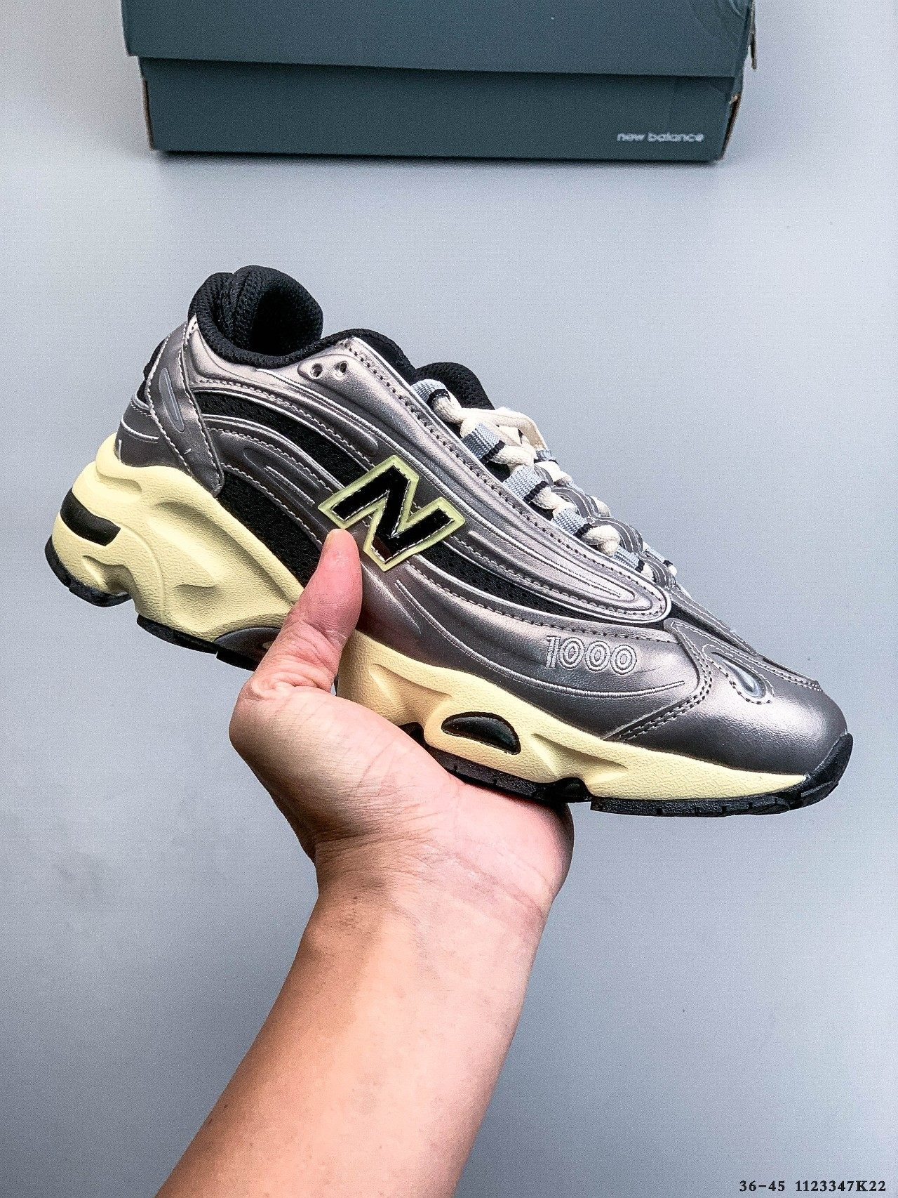 New Balance 1000 series low-cut retro dad-style casual sporty running shoes.