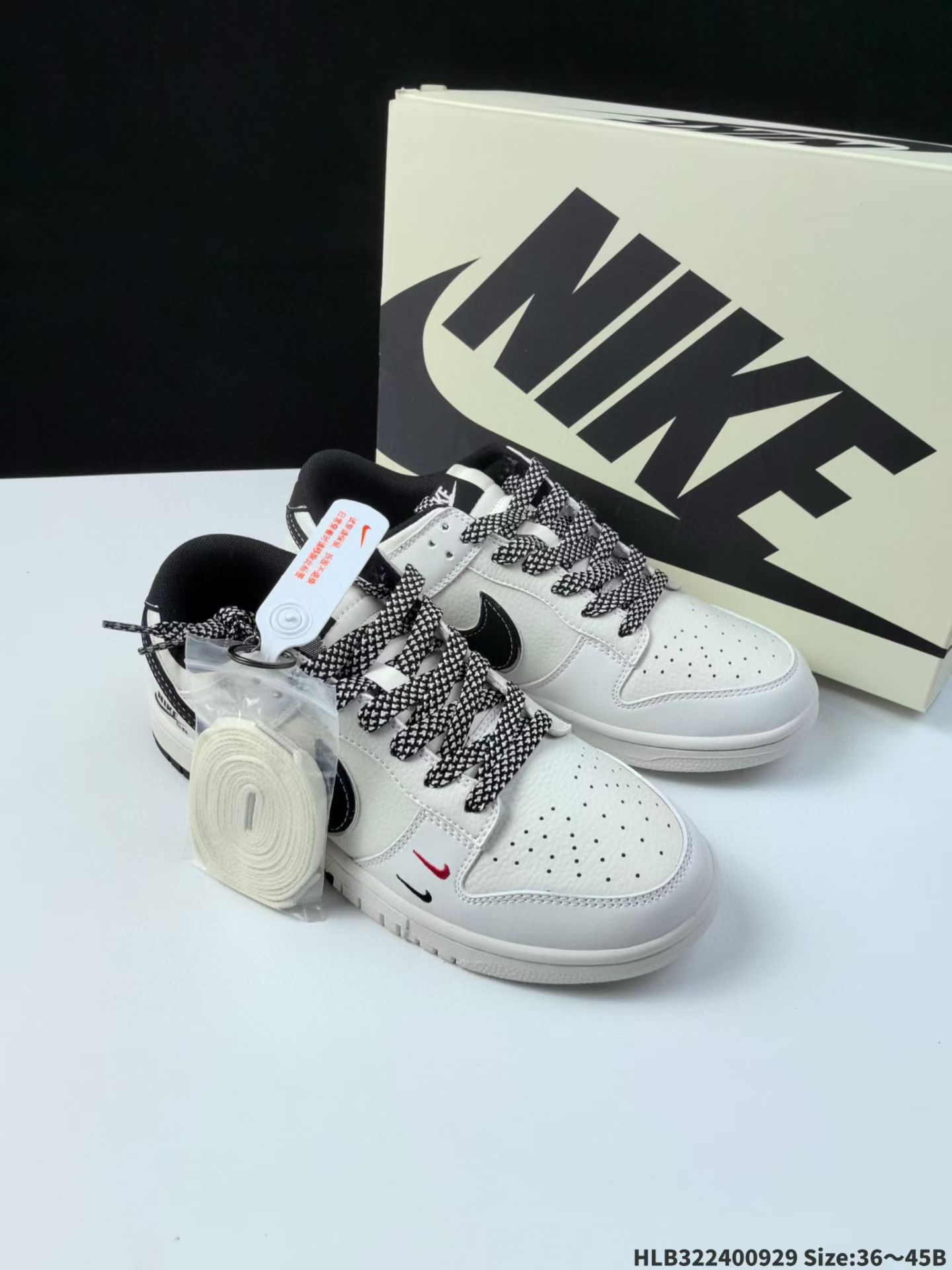 The Nike SB Dunk Low  BLACK/WHITE